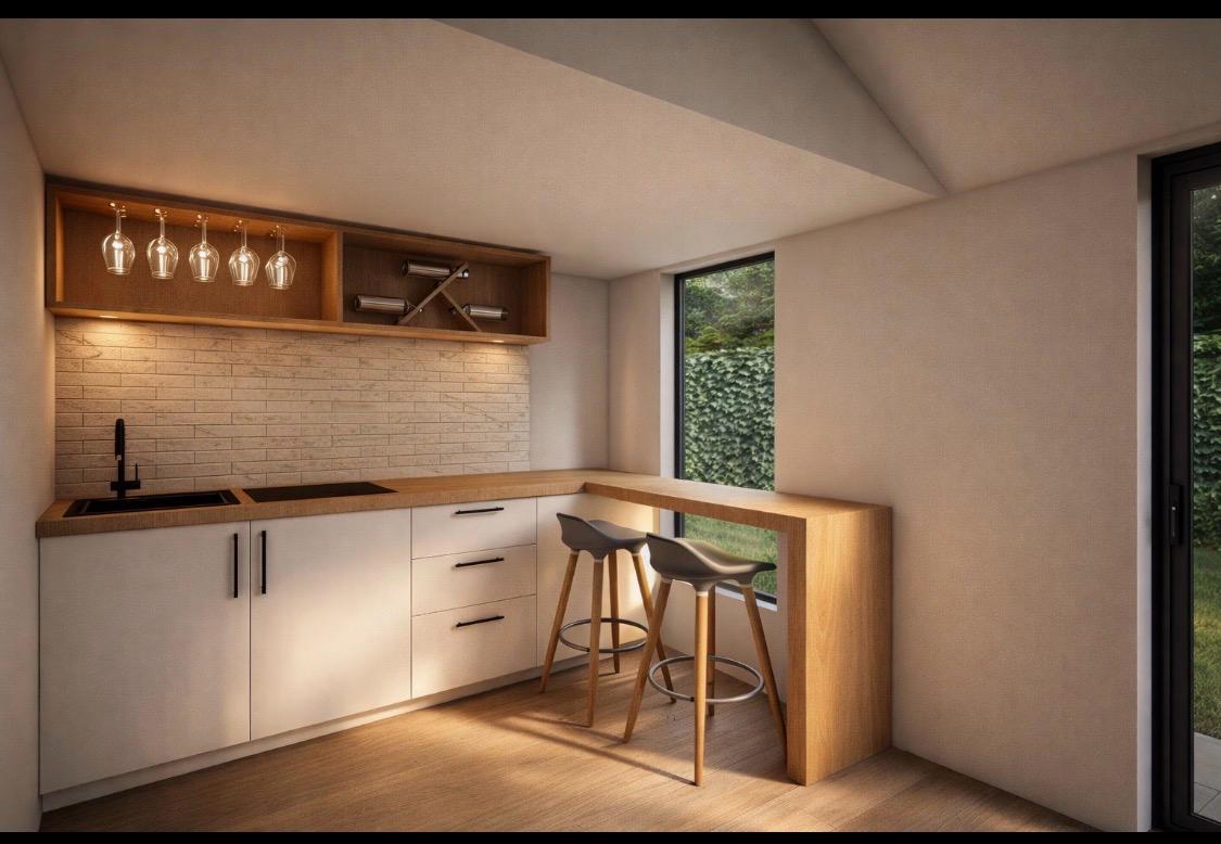 Fitted kitchen with breakfast bar