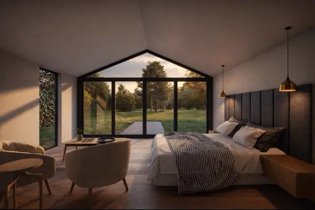 Bedroom with upholstered headboard and pendant lights